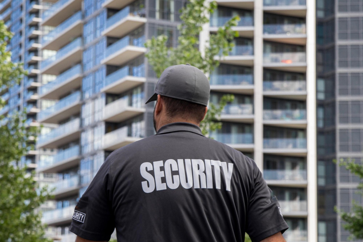 Commercial security guards controlling access at a business site