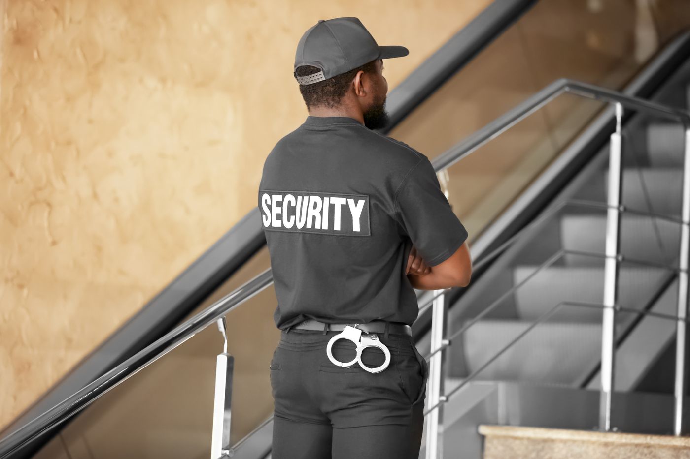 Professional security guard on duty inside a business premises